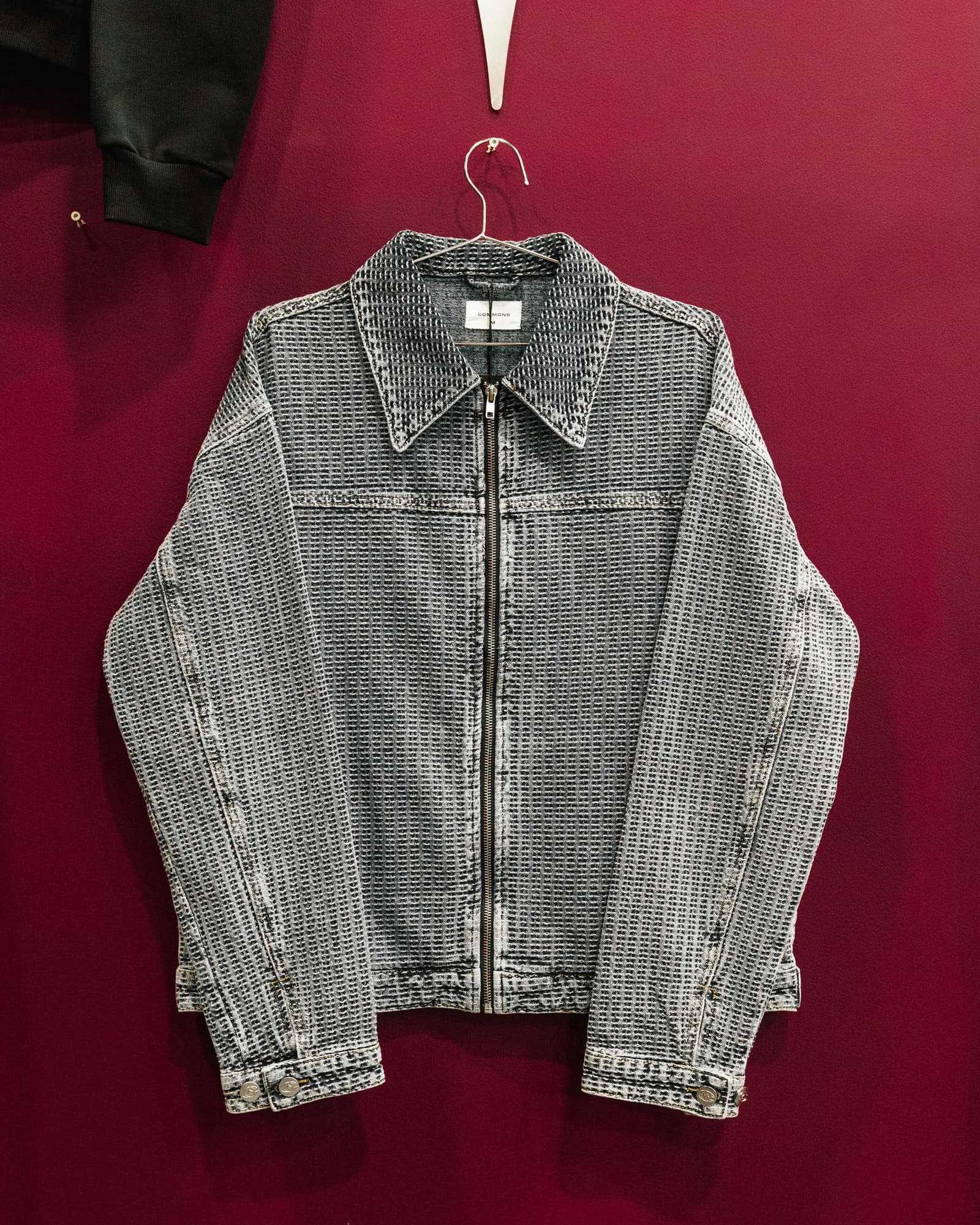Grey pinstriped Commons Studios denim jacket with zip-front construction