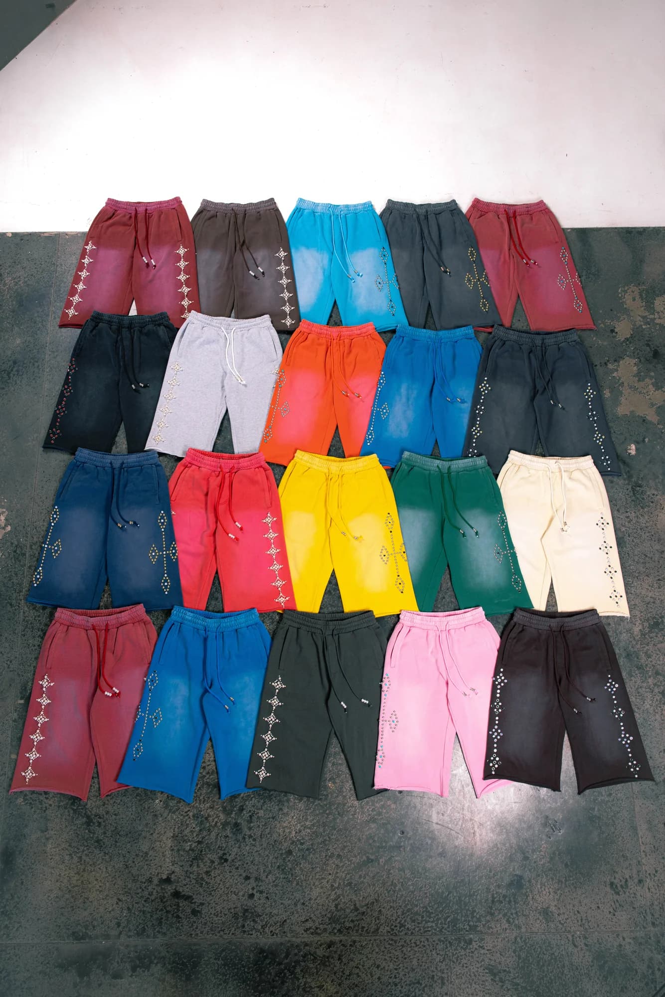 Commons Studios embellished shorts arranged in rows of assorted colors